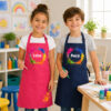 Unikatolo Kinderschürze personalisiert mit Name Farbkleckse GELB Unikatolo Kinderschürze personalisiert mit Name Farbkleckse GELB